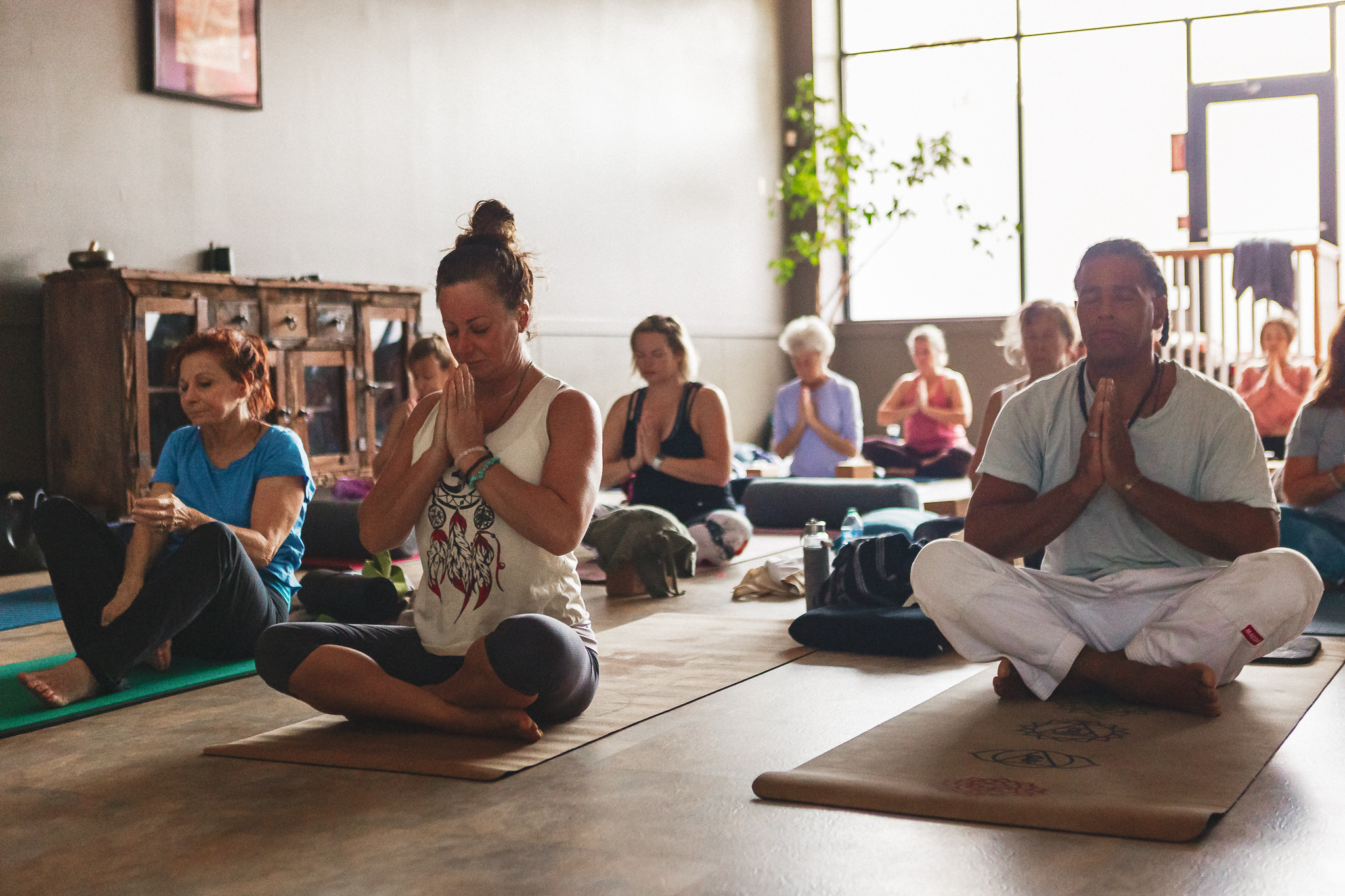 Yogis sitting at the end of class during Love Yoga Fest fall 2022 event